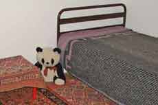 Односпальная кровать в апартаменте виллы "Эдита"