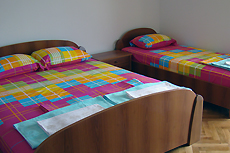 Спальня в апартаменте виллы "Белый чай" для отдыха в Черногори