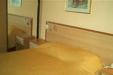  Широкая и удобная кровать в апартаменте отеля Palma в Черногории
