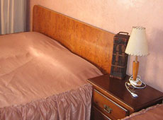 Двуспальная кровать в апартаменте отеля "Барселона"