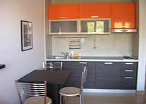  Удобная и функциональная кухня в апартаменте виллы «Томо Кожанегро»