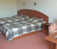 Кровать в номере отеля «Калиакра Палас»